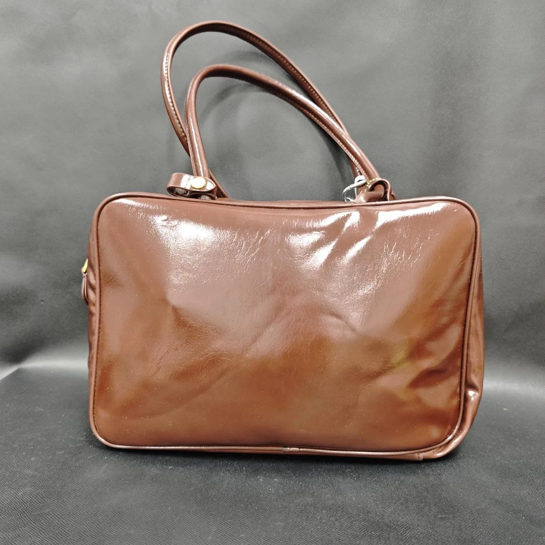 时尚潮流打造真皮女士手提包羽毛球包34.5CM 10854-1 棕色保龄球