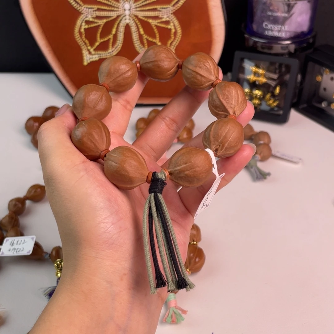 咕***泡橄榄核吊坠梅林铁核2126