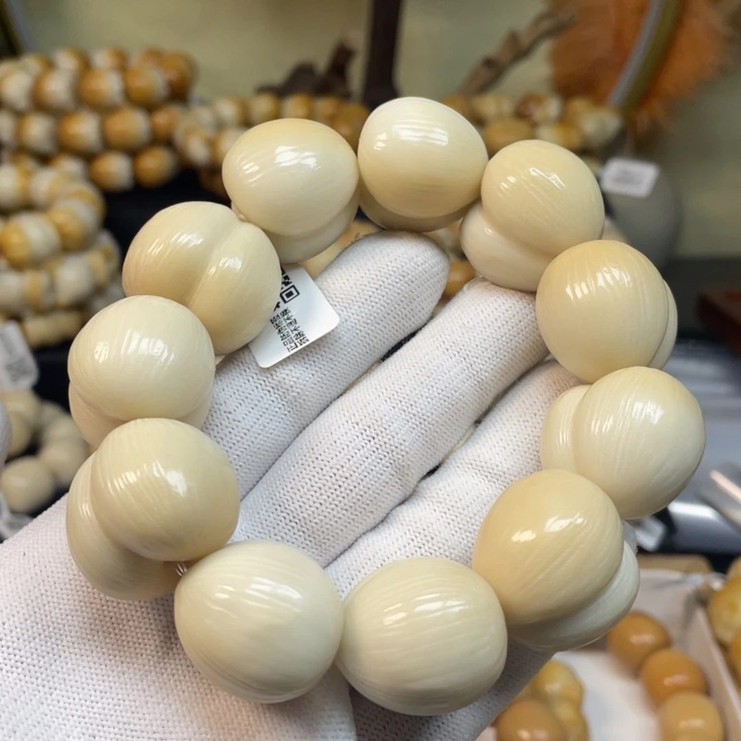 菩提根/象牙果手串115拉丝屁桃