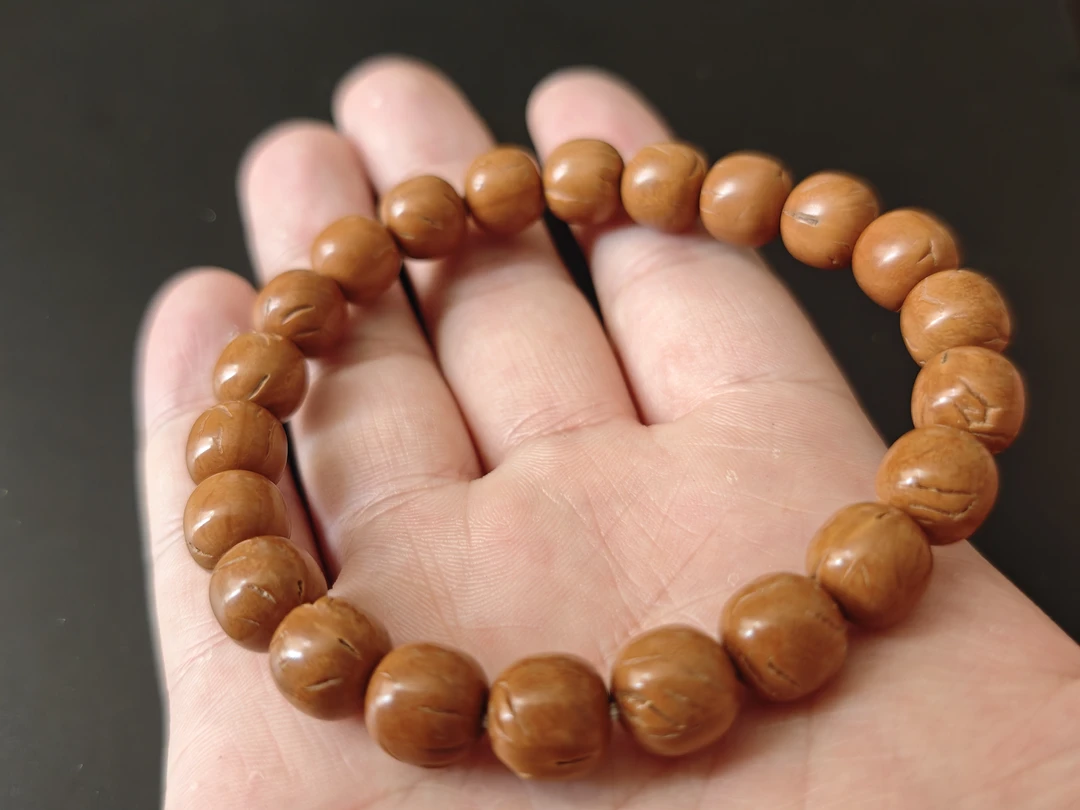 尺寸10mm左右龙纹桃核单圈老型手串天然原生态文玩