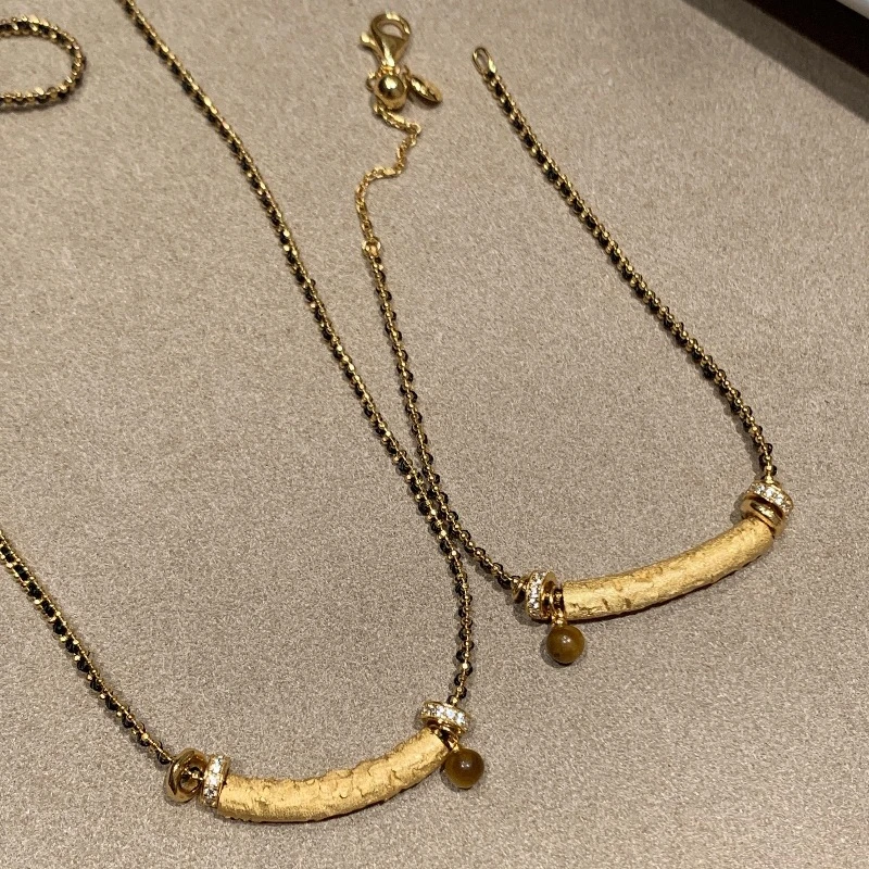 铜合金布艺项链 中古微笑弯管虎眼项链手链国风新中式编织黑绳