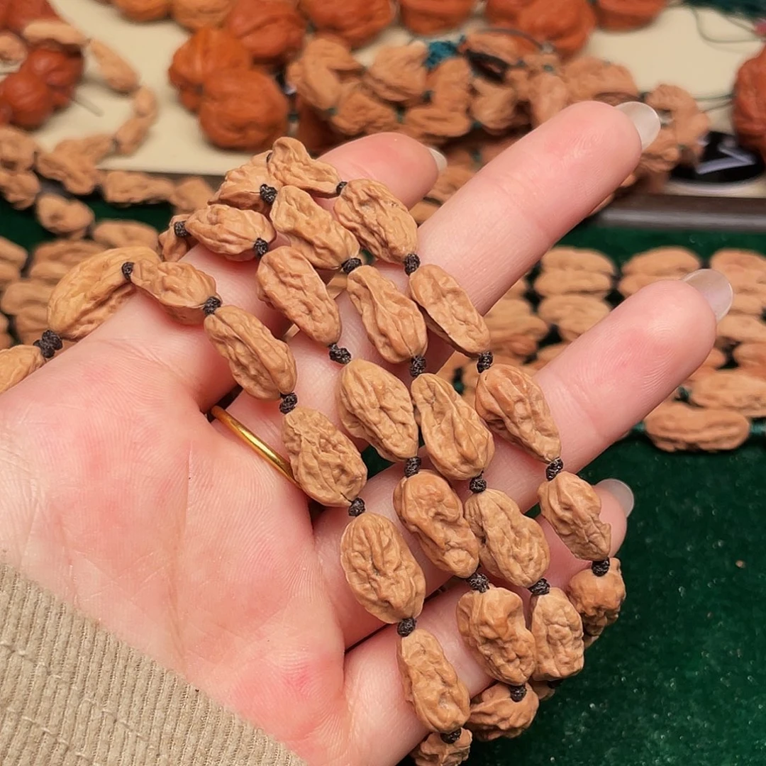 ઇ***࿐文玩核桃吊坠异形