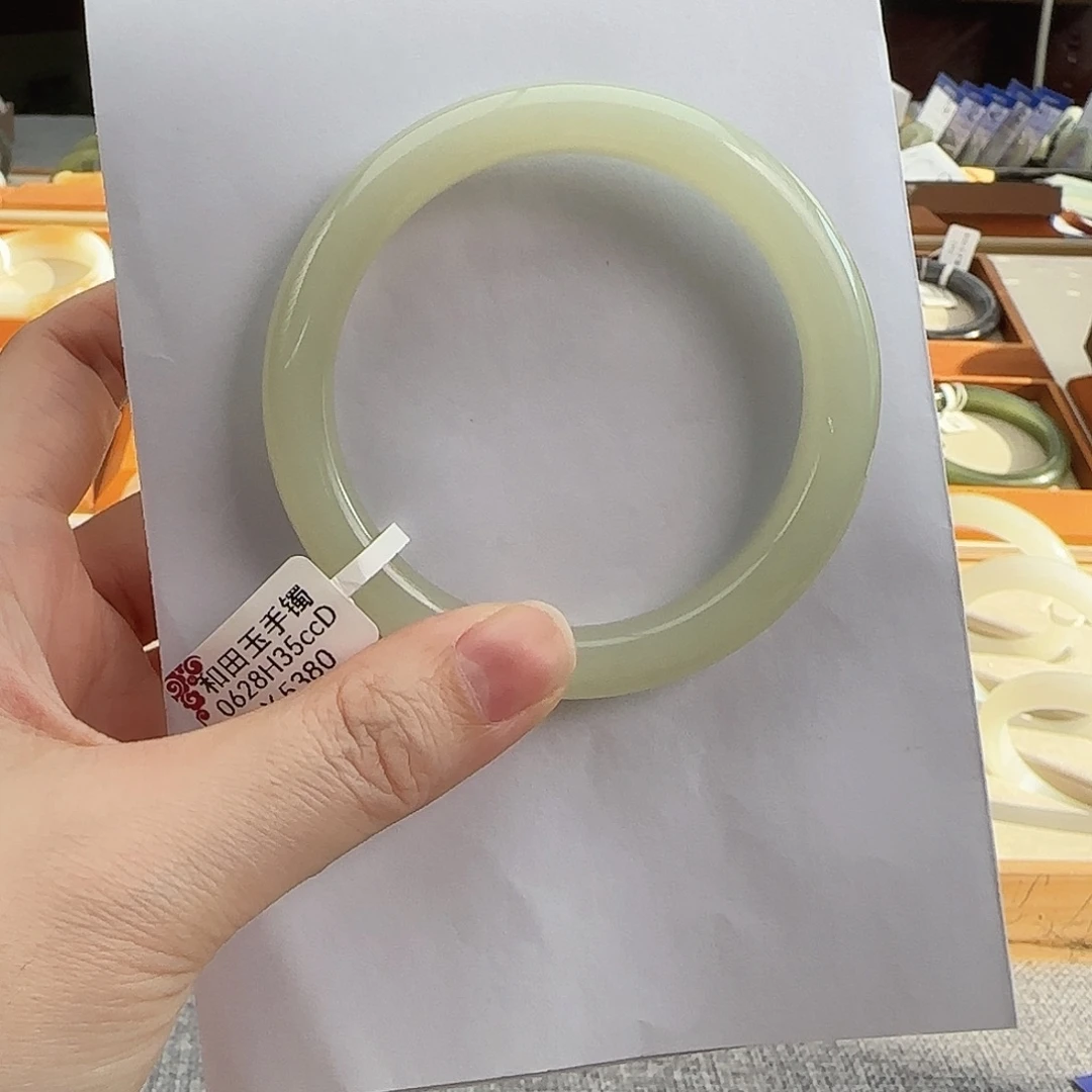 和田玉未镶嵌手镯60冰蜂蜜带微猫