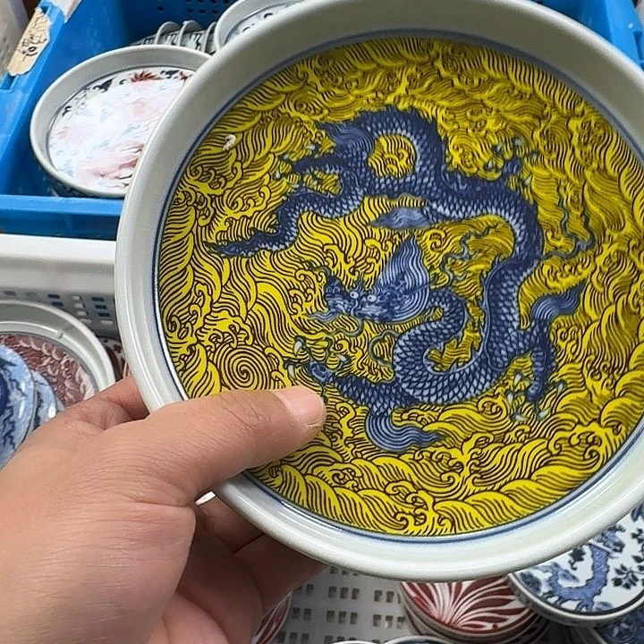 瓷片黄釉海水龙大壶承