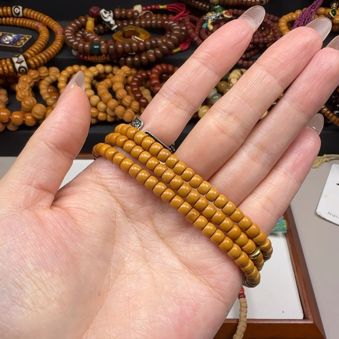 瑞***拜橄榄核手串核尖素串