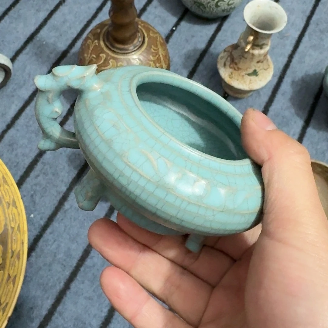 瓷片他斤斤计较了旅途头我哦又拖