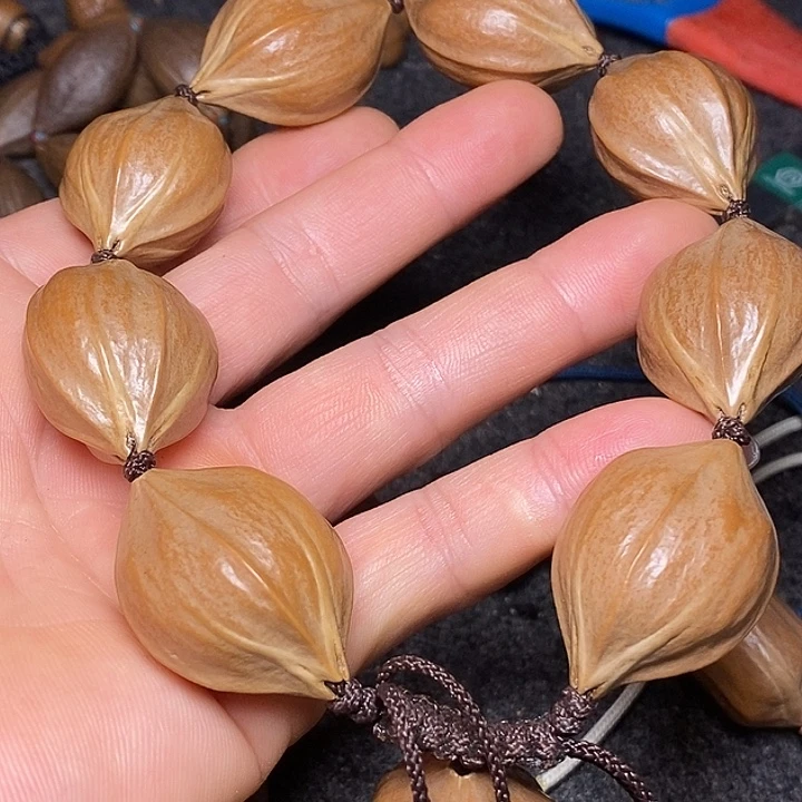 手串橄榄核2.4四花33号