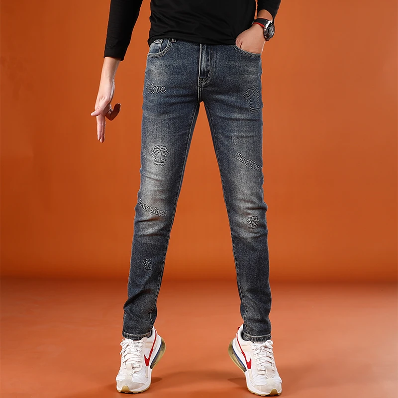高端潮流印花牛仔裤男2025秋季新款弹性厚款百搭裤子男修身小脚裤