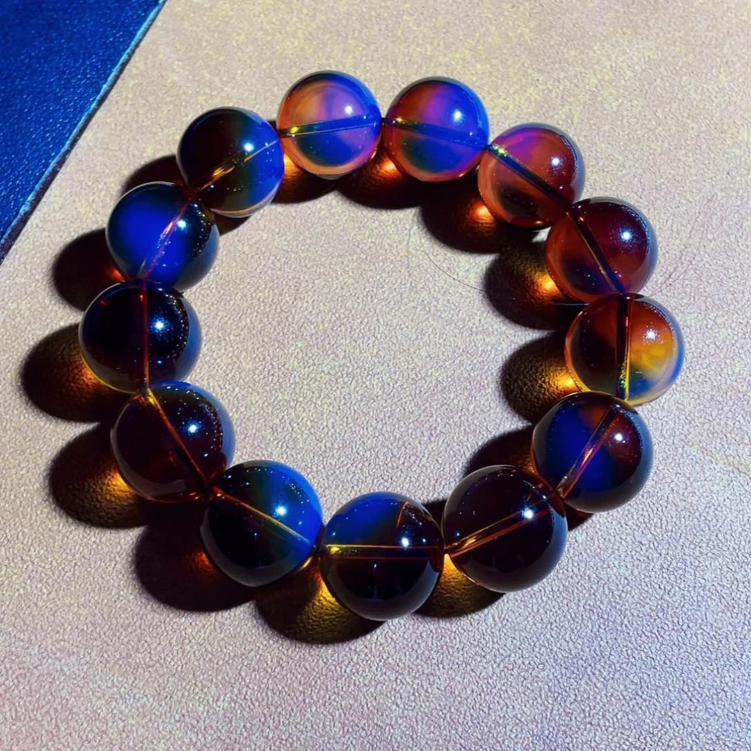 老***连未镶嵌蓝珀裸石红蓝16净水