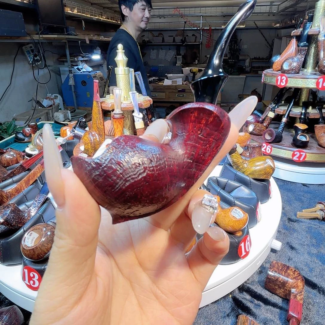 我***呢焦耀烟斗一小河豚