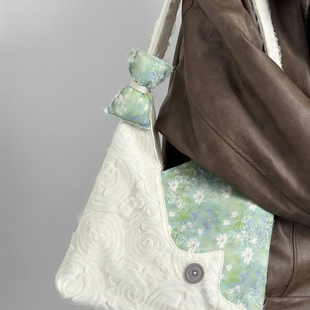 小清新绿色雏菊帆布包女2025新款大容量通勤托特包蕾丝单肩斜挎包