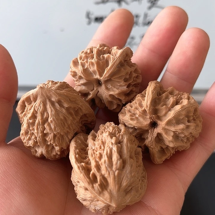 文玩核桃把件苹果园和盘龙虎头