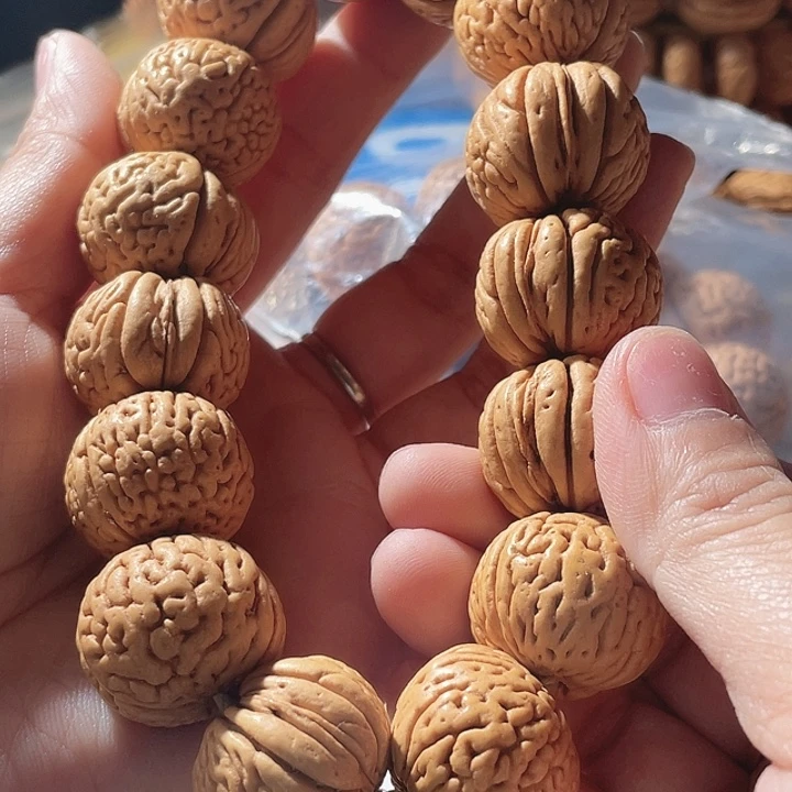 斐***斐桃核吊坠桃核手串金钱豹40