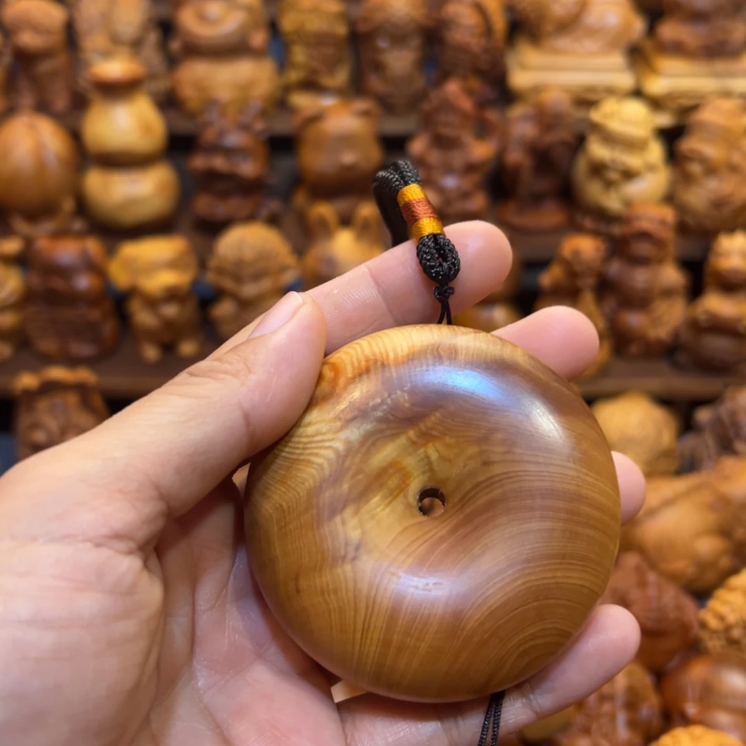 那***卡柏木（崖柏）陈化料手把件