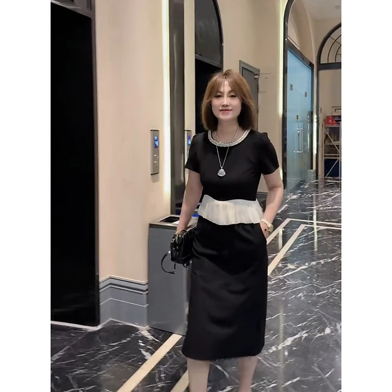 时尚气质拼接显瘦收腰显瘦连衣裙女中长款休闲裙子潮2025早秋新款