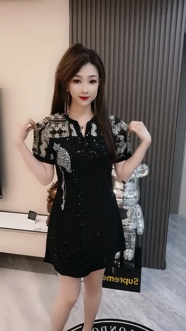 欧洲站2025夏季新款洋气闪闪烫钻宽松显瘦高级拼接气质碎花连衣裙