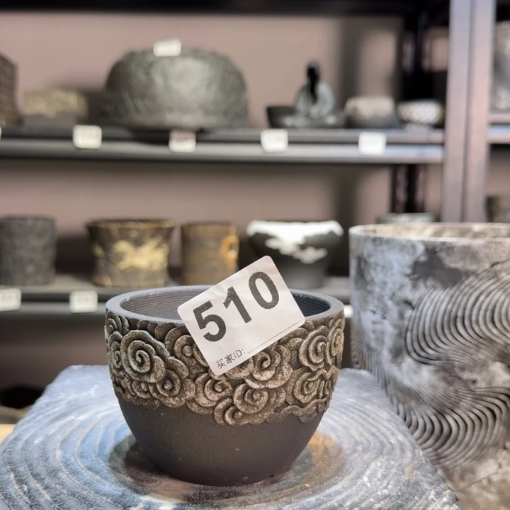 黑陶无釉内口9高7.3祥云