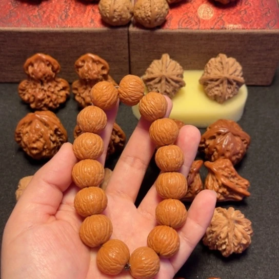 文玩核桃吊坠猴头手串