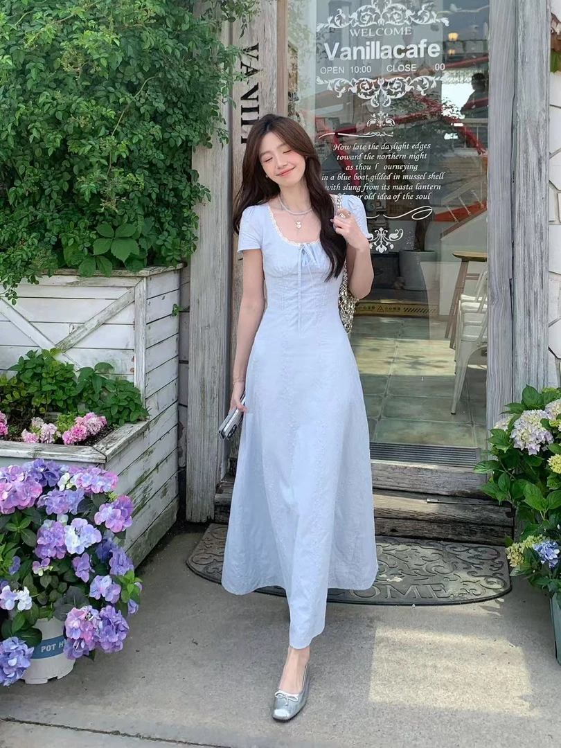 温柔风蕾丝拼接短袖连衣裙女2025夏季新款设计感收腰显瘦A字短裙