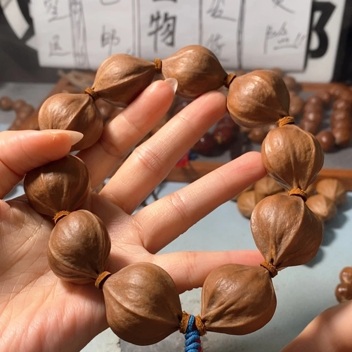 橄榄核手串1372精品4花老树王蒜头铁核9+1颗