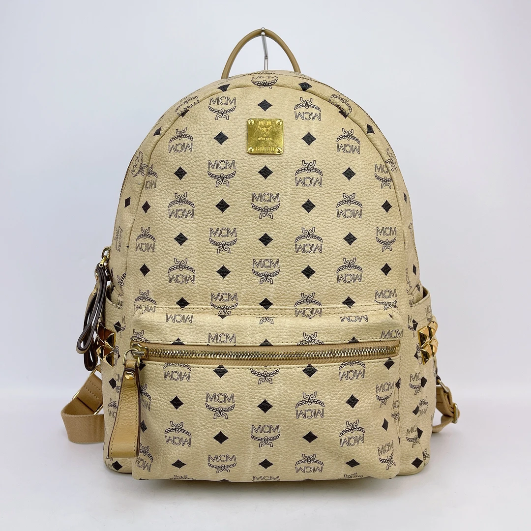 95新 MCM MCM 米色老花双肩包底长33 H856