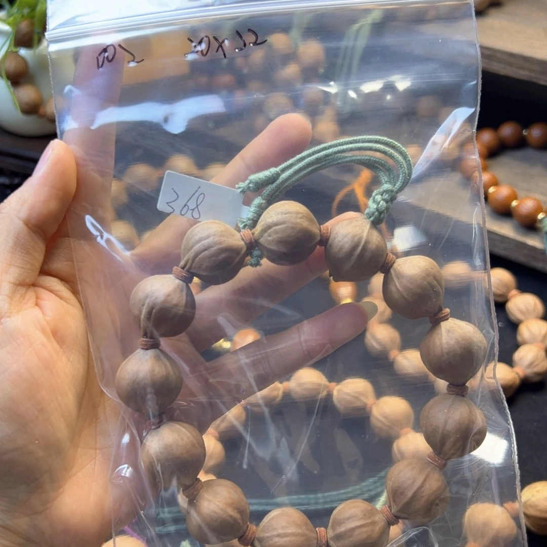 手串橄榄核一**芳002。20×22