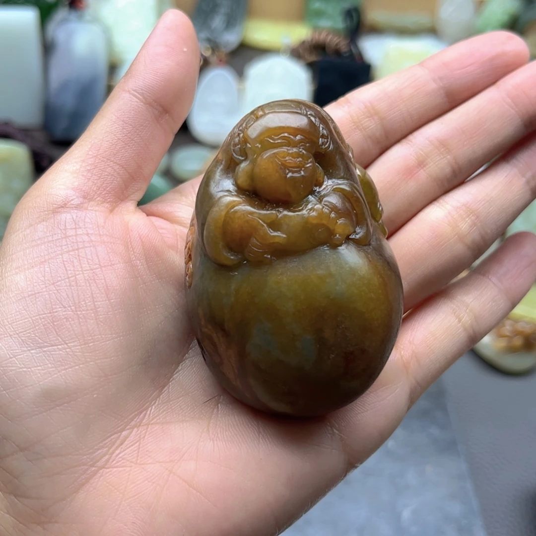 杨***伯和田玉未镶嵌把件