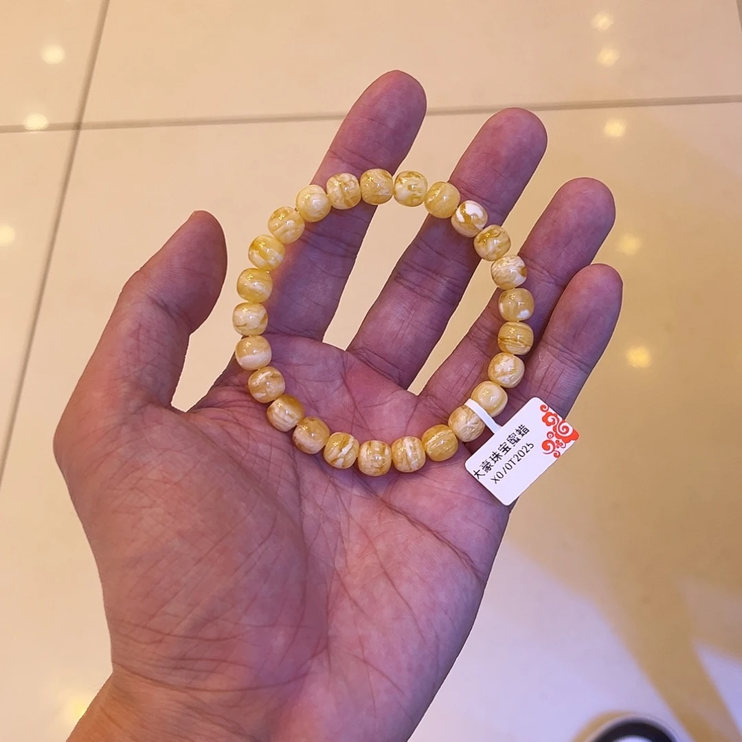 黑***羽蜜蜡未镶嵌手串白花虎皮8.7mm