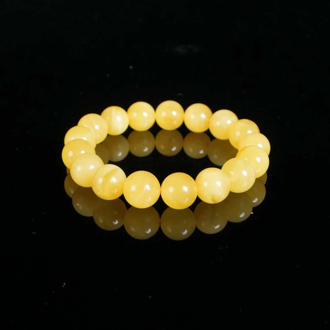 DY-B9215    11+俄料满蜜机油黄手串13.18g