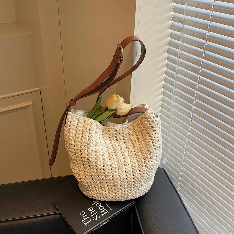大容量编织包包女2025新款夏季海边度假沙滩包百搭单肩斜挎水桶包