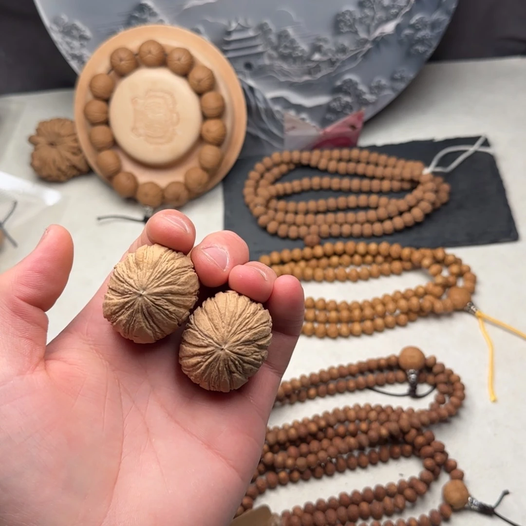 柏香籽/百香籽吊坠J****喽猴头元宝