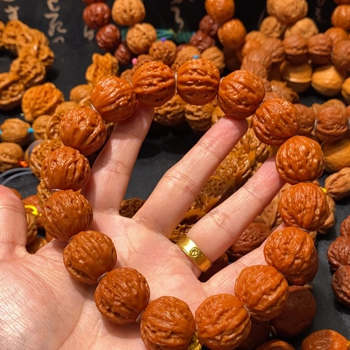 有***曼木质荔枝纹核桃手串