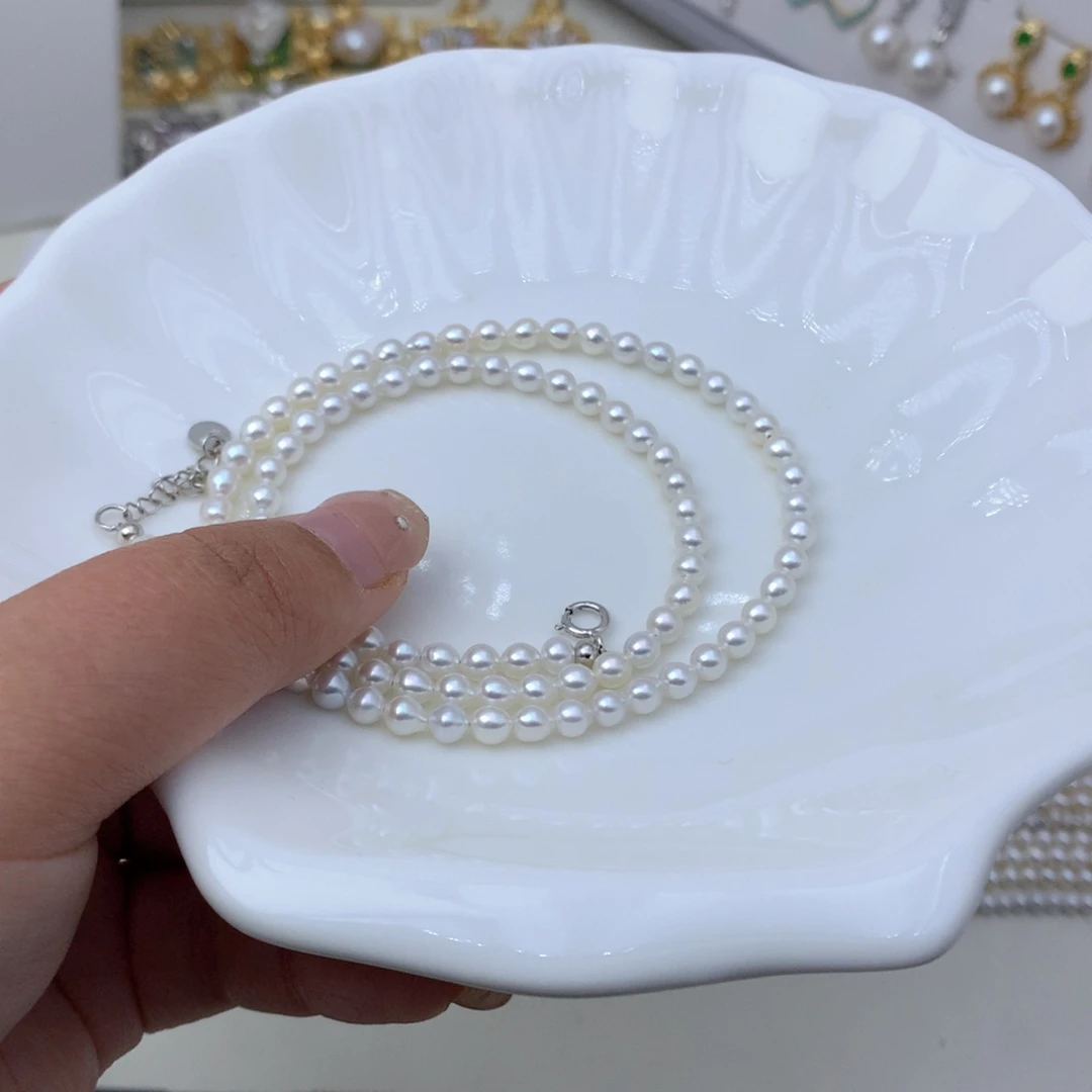 星***辰淡水珍珠银S925镶嵌颈饰