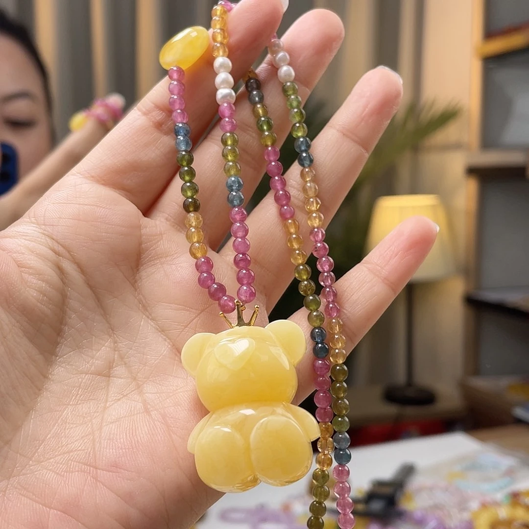 蓝珀裸石18K金镶嵌蜜蜡吊坠