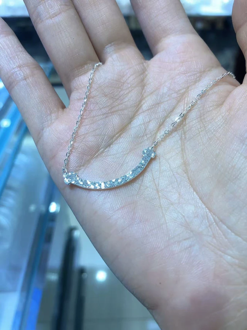 坠链均足银 足银999.9笑脸项链一体