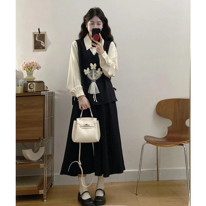 2025早春大码假两件蝴蝶结系带花朵衬衣搭配半身裙两件套套装