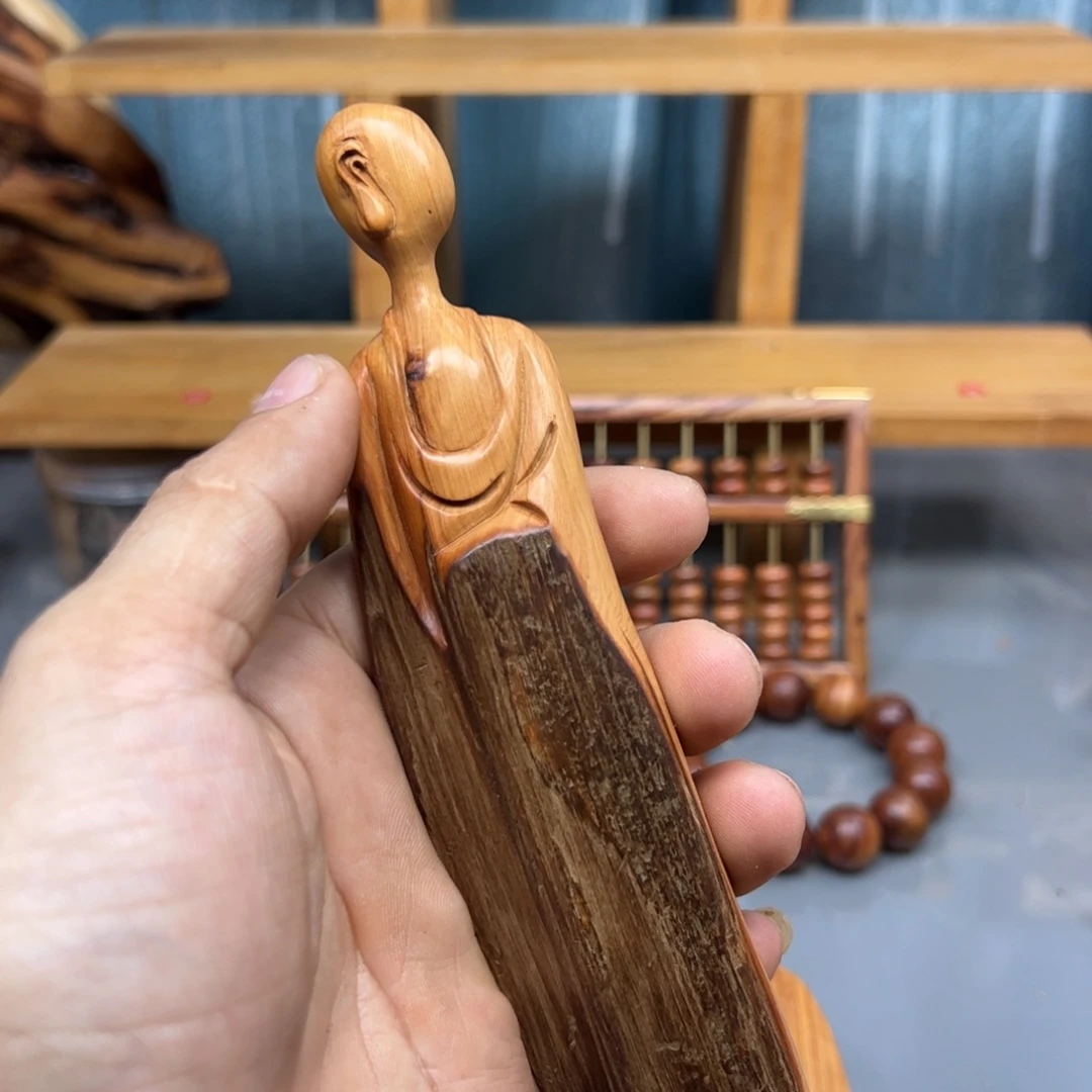 刘***6木崖柏木摆件手把件