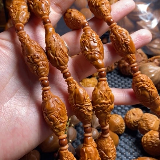 橄榄核吊坠S****k骑兽罗汉