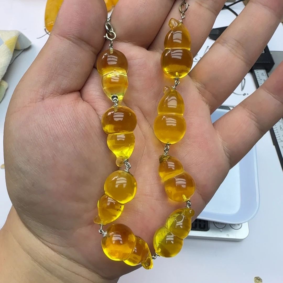 琥珀未镶嵌裸石葫芦一串约20克微微瑕