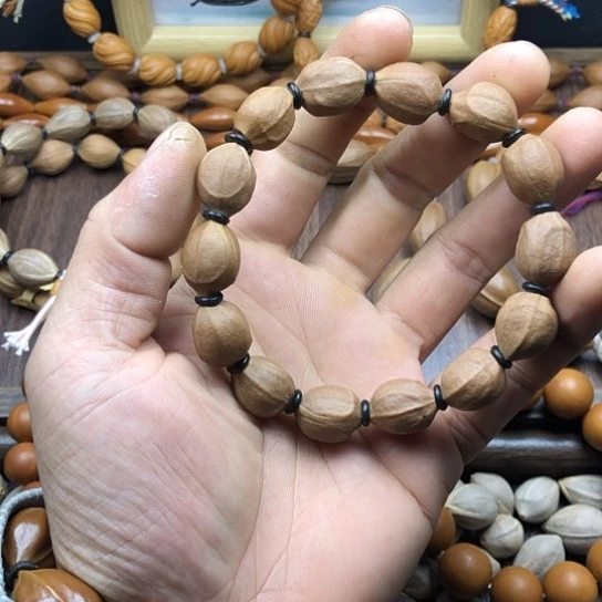 橄榄核吊坠蜜桃臀