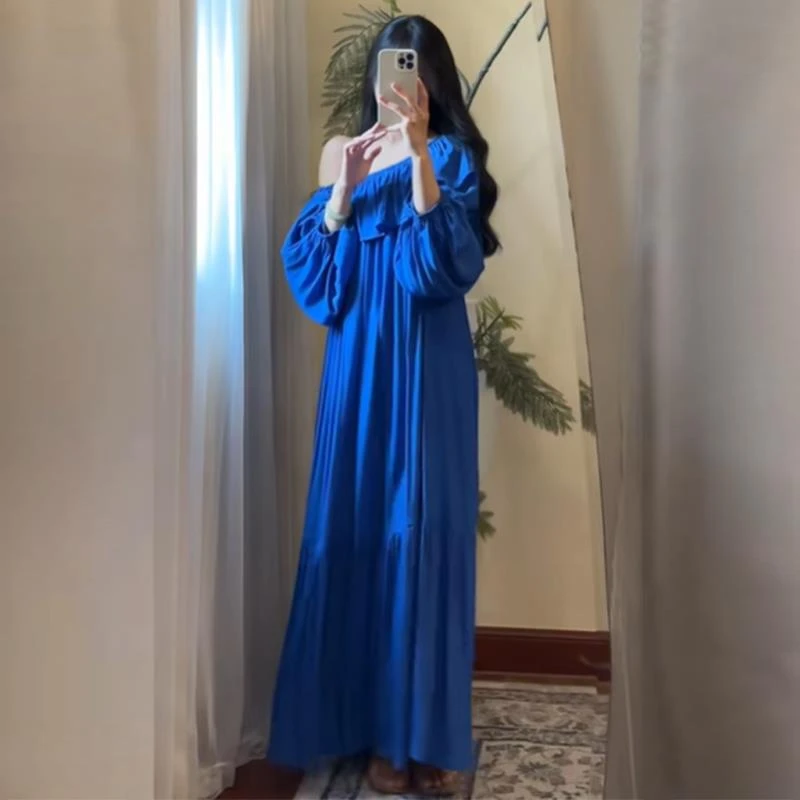 法式温柔风蓝色斜肩连衣裙夏海边度假超好看独特漂亮宽松a字长裙