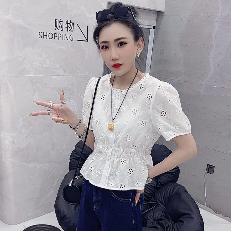 欧货收腰花朵镂空衫