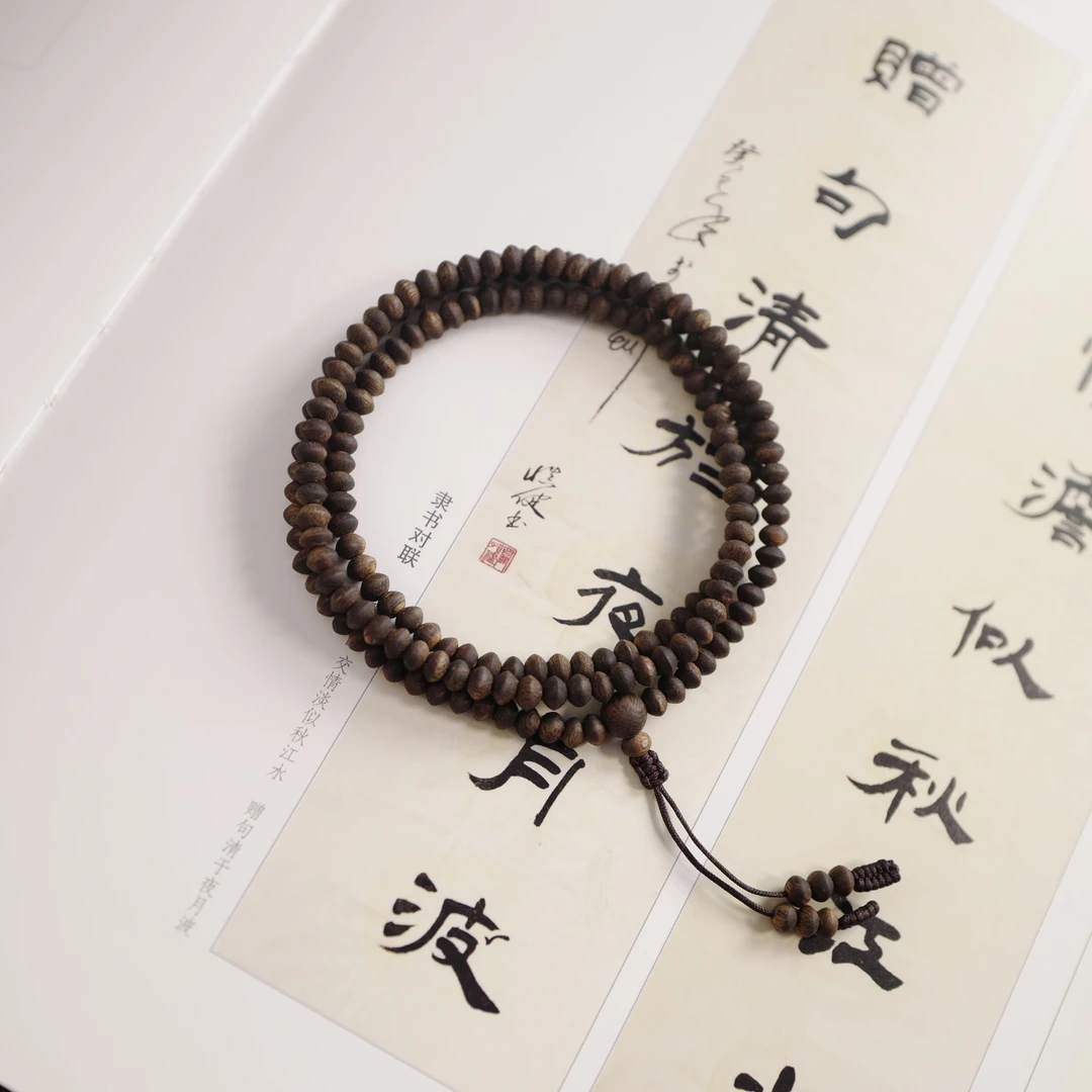 沉香【沉水级】5mm奇楠沉香飞碟珠多圈长串 素 S250459