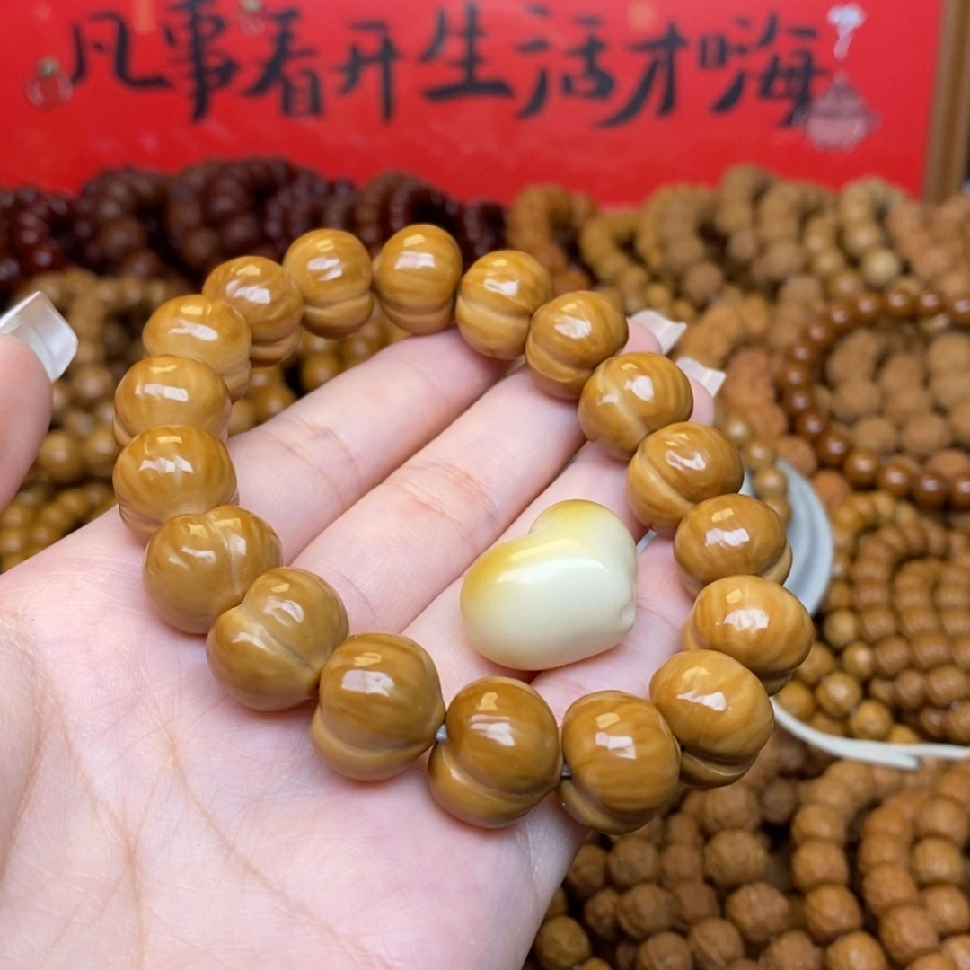 麦****吊坠猴头核桃猴头15尺二等屁桃➕爱心配饰