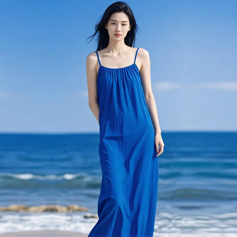 纯色吊带连衣裙女过膝长款新款海边度假风背心裙克莱因蓝沙滩裙子