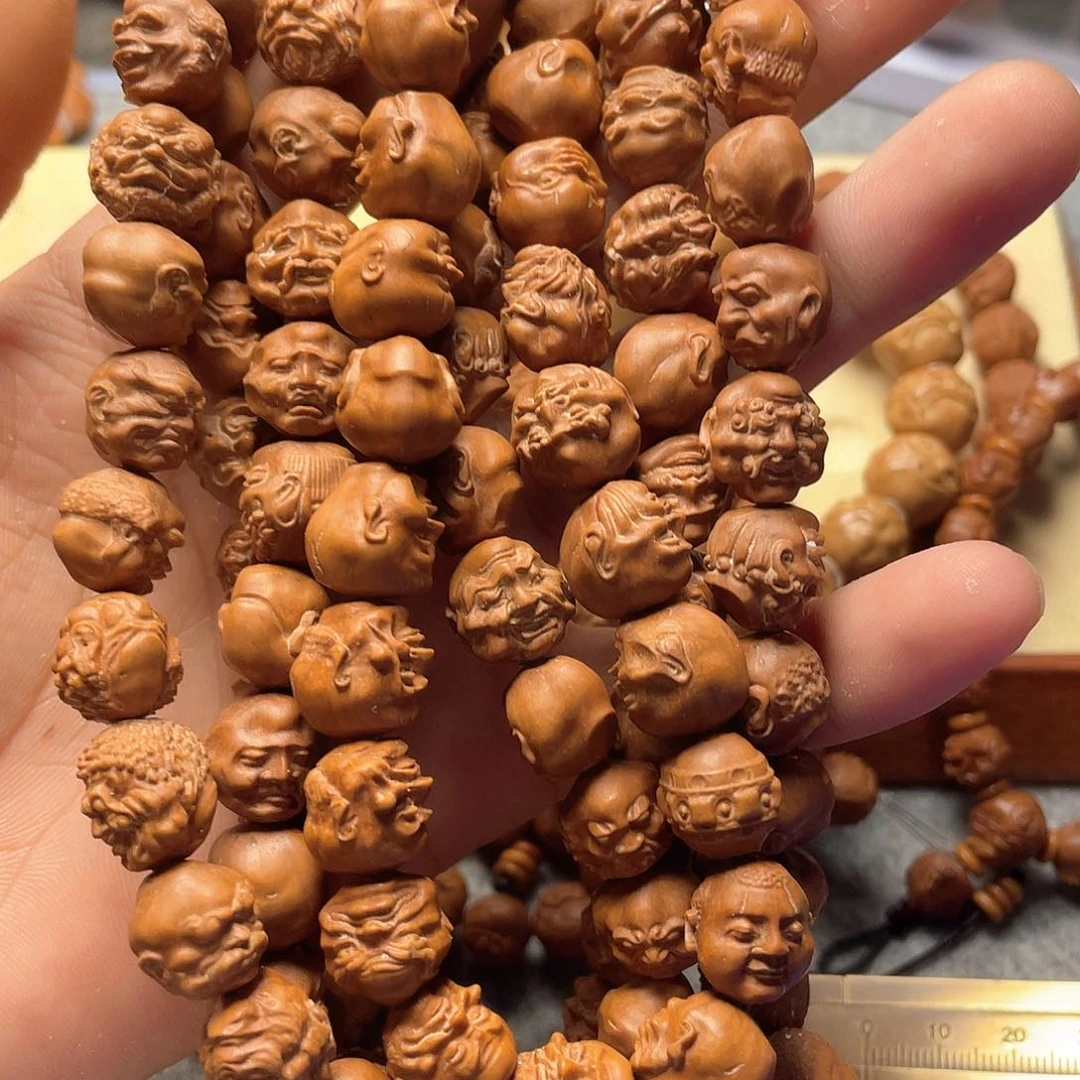 龙纹桃核雕刻108罗汉（色差）