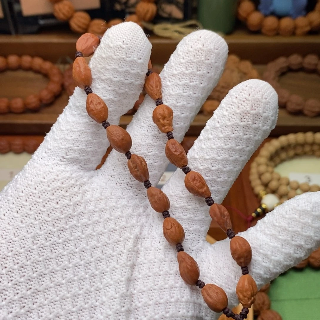 文玩核桃吊坠小瓜子异形