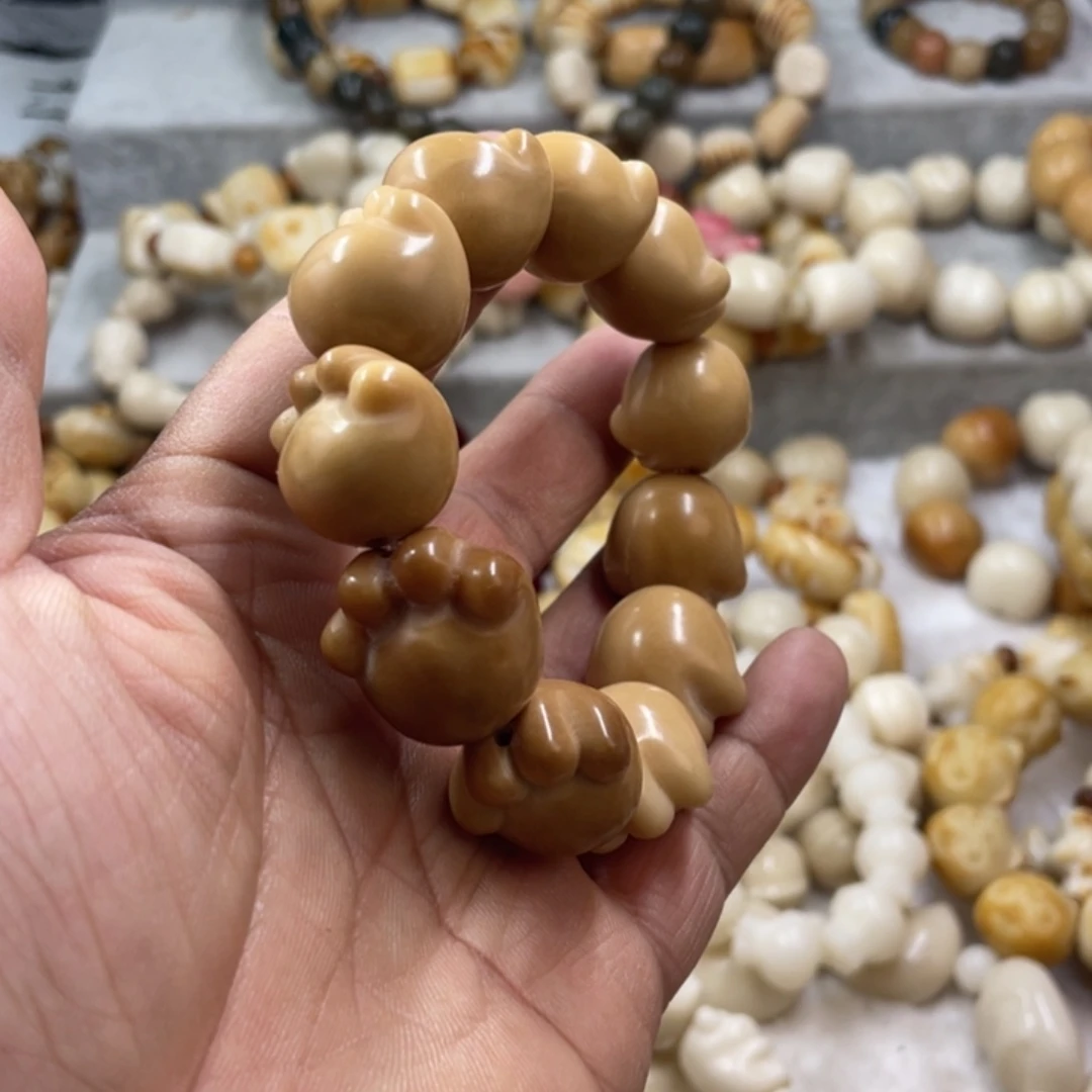 吊坠菩提根/象牙果微瑕猫爪手串一条