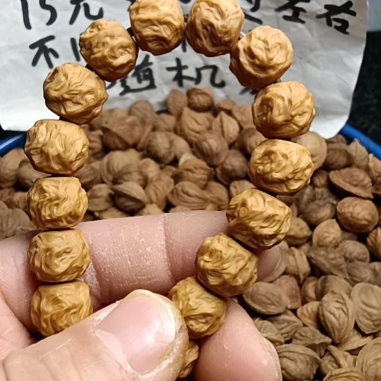 桃核吊坠猴头手串12+炫鸟