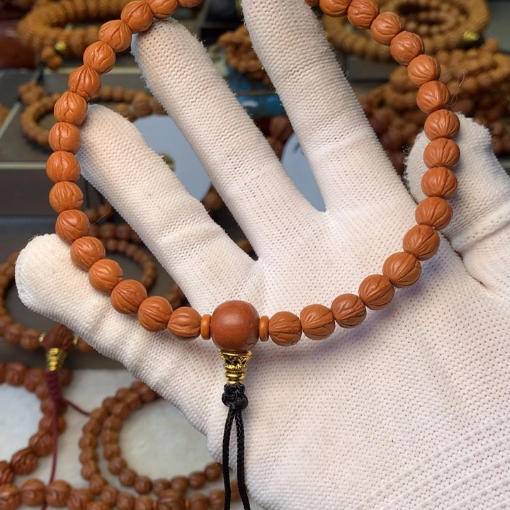 孤****桃核手串秦岭龙纹